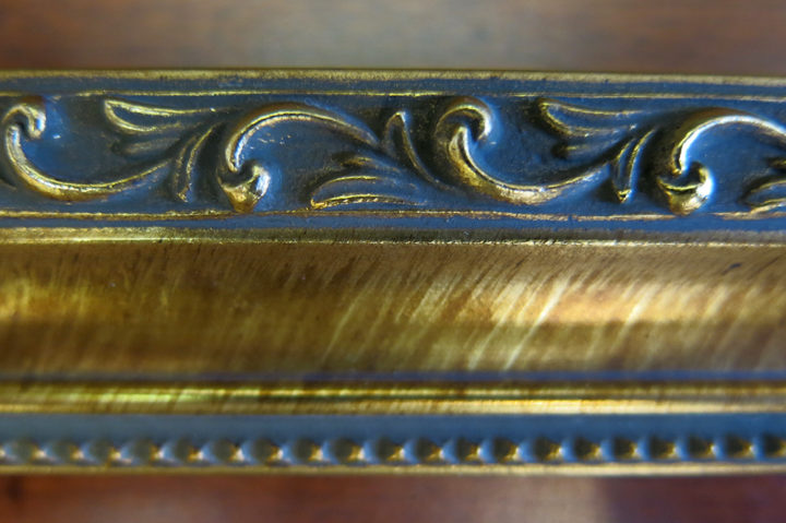 gold wood frame knight close up