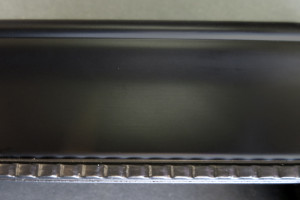 black studded picture frame close up